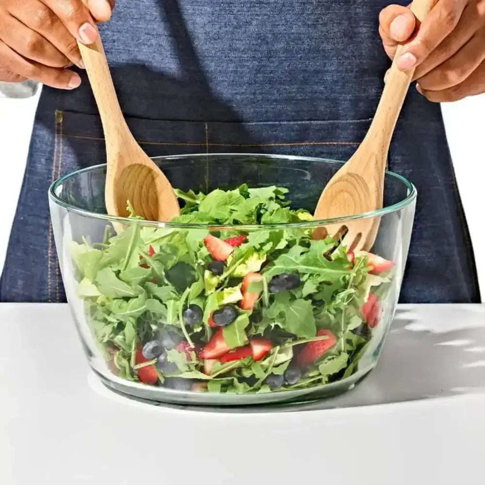 OXO beechwood salad servers tossing a fresh salad