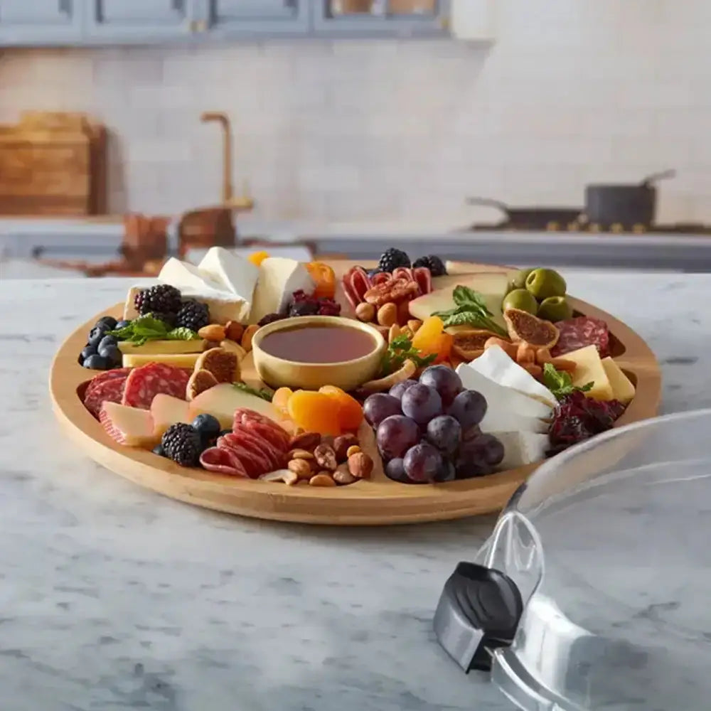 Farberware divided bamboo serving board arranged for grazing