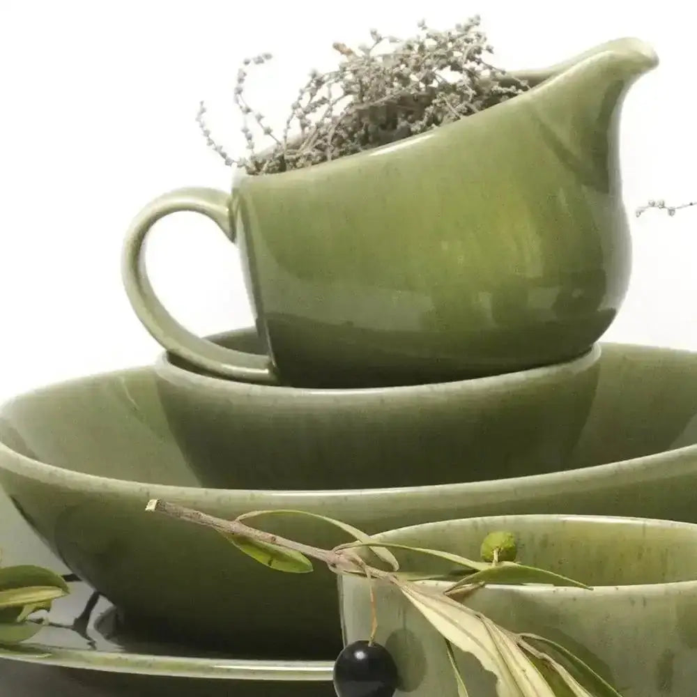 Jan Ashes and Olive cups and saucers in glazed green stoneware